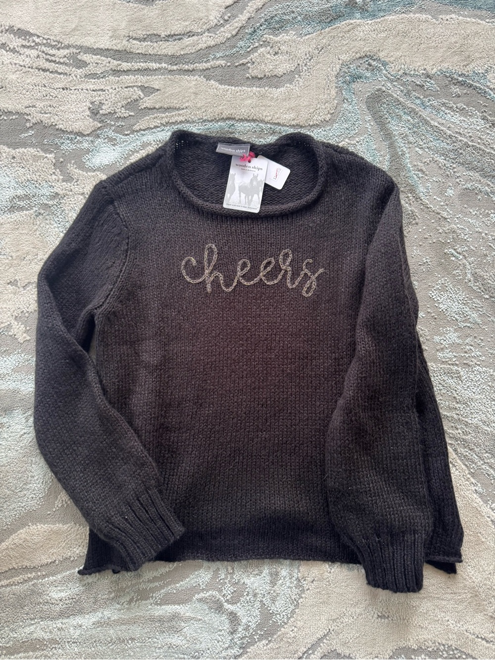 Wooden Ships Black Crewneck Sweater with "cheers" Embroidery
